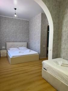 Postel nebo postele na pokoji v ubytování Hotel Old Boulvared