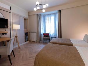 Postel nebo postele na pokoji v ubytování Mercure Belgrade Excelsior