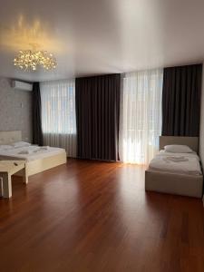 Postel nebo postele na pokoji v ubytování Hotel Old Boulvared