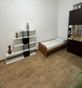 Postel nebo postele na pokoji v ubytování Parisa Home + 4 fotografie