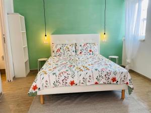 Ένα ή περισσότερα κρεβάτια σε δωμάτιο στο Piccolo Amore