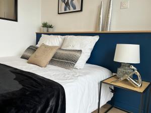 Postel nebo postele na pokoji v ubytování L'Ancre Douce - Romantique et Cocooning