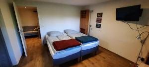 Postel nebo postele na pokoji v ubytování Ferienwohnung Tuniberg