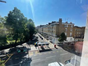 a view of an empty street in a city at Somerset Hotel Baker Street London in London