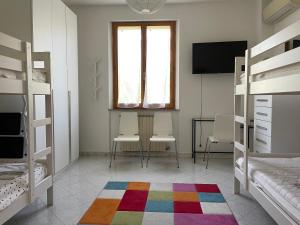 TV a/nebo společenská místnost v ubytování Un posto tranquillo