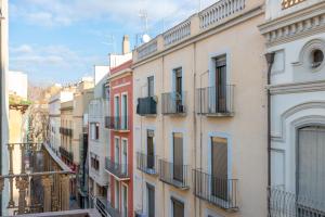 a row of buildings in a city with balconies at Milenial Immo VT2-1 Figueres Dali Museum and Rambla in Figueres
