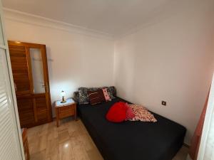 A bed or beds in a room at Duplex House on the Castle Road with a Seaview