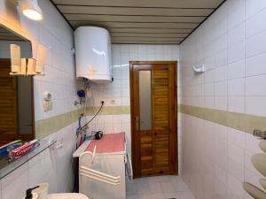 A bathroom at Duplex House on the Castle Road with a Seaview