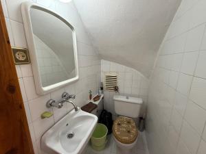 A bathroom at Duplex House on the Castle Road with a Seaview