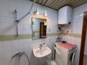 A bathroom at Duplex House on the Castle Road with a Seaview