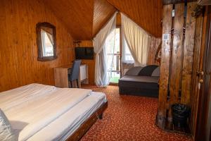 Voodi või voodid majutusasutuse Silveroks Hotel toas