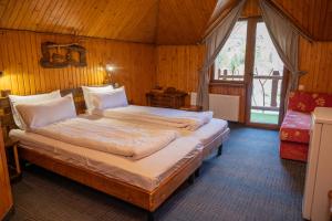 Postel nebo postele na pokoji v ubytování Silveroks Hotel + 37 fotografií