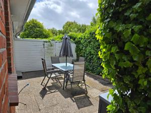 Zahrada ubytování Ferienhaus Norderny direkt am Deich, Fledderweg 8 in Norddeich