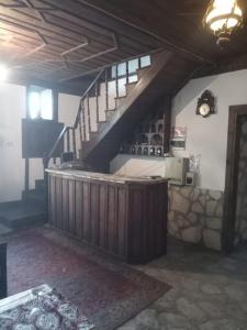 a room with a staircase in a house at Han Safranbolu in Safranbolu