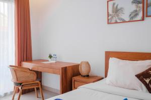 Postel nebo postele na pokoji v ubytování Bali intan Canggu