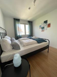 En eller flere senge i et værelse på City-Apartment mit Theaterblick