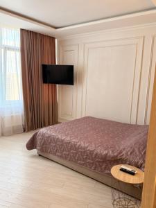 Postel nebo postele na pokoji v ubytování Квартира студия,с прямым видом на море! в Аркадии.На Каманина!