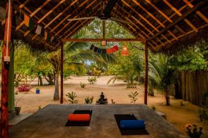 Zahrada ubytování Bliss Yoga cottage & Shala Arugam Bay