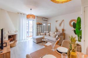 a living room with a couch and a table at Espanatour SANTA ROSARIA in La Mata