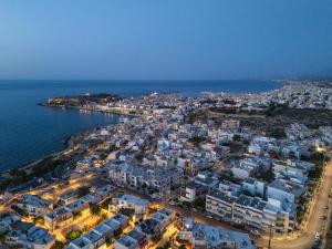 an aerial view of a city next to the ocean at Private Rooftop Jacuzzi Sea View Walk to Beach in Rethymno