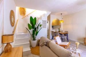 a living room with a couch and a table at Espanatour SANTA ROSARIA in La Mata