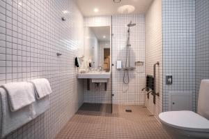 Koupelna v ubytování Thon Partner Hotel Ullevaal Stadion + 27 fotografií