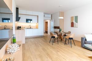 A kitchen or kitchenette at SOLARIS APARTMÁNY Pálava
