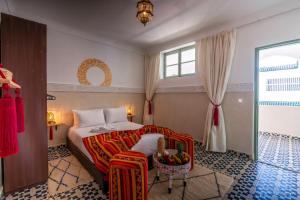 Postel nebo postele na pokoji v ubytování Palais Moulay Said & SPA + 37 fotografií