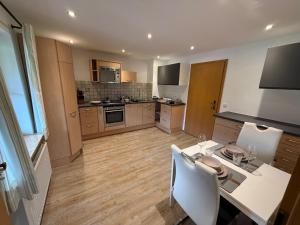 Kuchyň nebo kuchyňský kout v ubytování Ferienwohnung Bergsonne + 6 fotografií