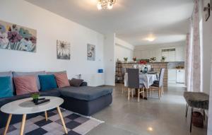 a living room with a couch and a table at Apartman Marija Slano by Villas Guide in Slano