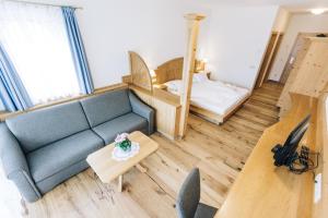 Posteľ alebo postele v izbe v ubytovaní Hotel Tenz