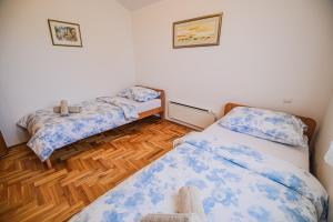 Postel nebo postele na pokoji v ubytování Apartment Tomislav