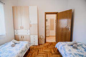 Postel nebo postele na pokoji v ubytování Apartment Tomislav