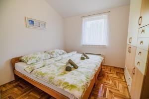 Postel nebo postele na pokoji v ubytování Apartment Tomislav