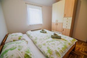 Postel nebo postele na pokoji v ubytování Apartment Tomislav