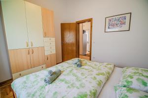 Postel nebo postele na pokoji v ubytování Apartment Tomislav