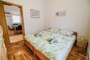Postel nebo postele na pokoji v ubytování Apartment Tomislav