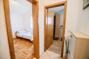 Postel nebo postele na pokoji v ubytování Apartment Tomislav