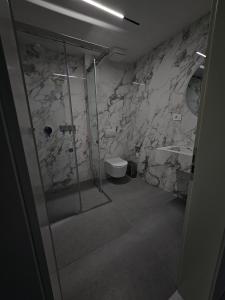 Koupelna v ubytování Hotel Agron + 13 fotografií