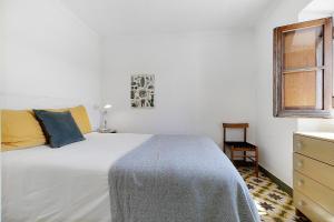 En eller flere senge i et værelse på Casa Limao old city Aljezur charming house with private patio and marvelous view