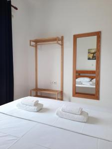 Amarildo Hotel客房内的一张或多张床位