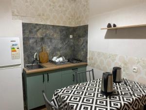 Kuchyň nebo kuchyňský kout v ubytování Hotel Prime + 27 fotografií