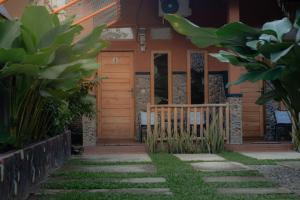 Zahrada ubytování Sempurna Guest House & Jungle Trekking