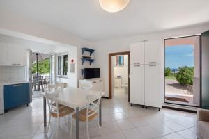 Η κουζίνα ή μικρή κουζίνα στο Villa Zafferano Suites - Lavanda