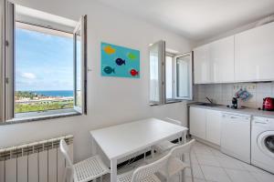 Kuchyň nebo kuchyňský kout v ubytování Villa Zafferano Suites - Mentuccia