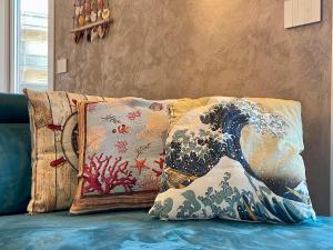 Ruang duduk di Bilocale con terrazzo e garage – Casa Ondina
