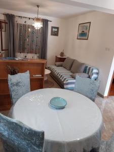 a living room with a table and a couch at Boris in Vela Luka