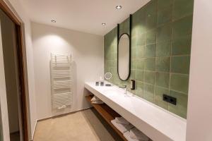 Kúpeľňa v ubytovaní Hotel Tenz
