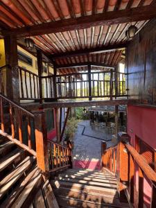 an overhead view of an old building with a balcony at Vila Pequeá Ilhabela in Ilhabela
