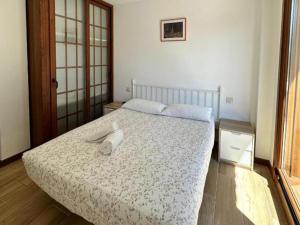 Postel nebo postele na pokoji v ubytování Top Sanxenxo 3000